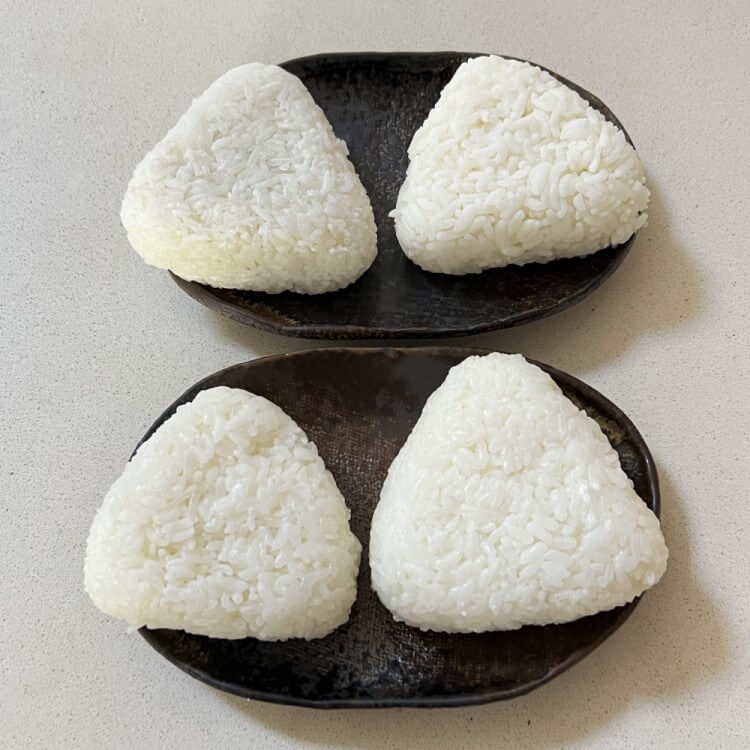 Triangle onigiri riceballs on plates