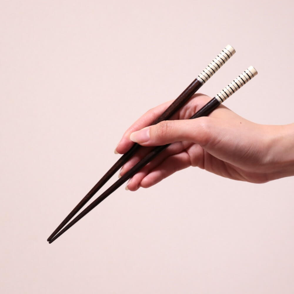 japanese chopsticks held by hand used in majime life blog