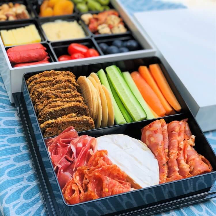 Shirayuki 2 tier picnic bento box from Majime Life showing charcuterie food arrangement