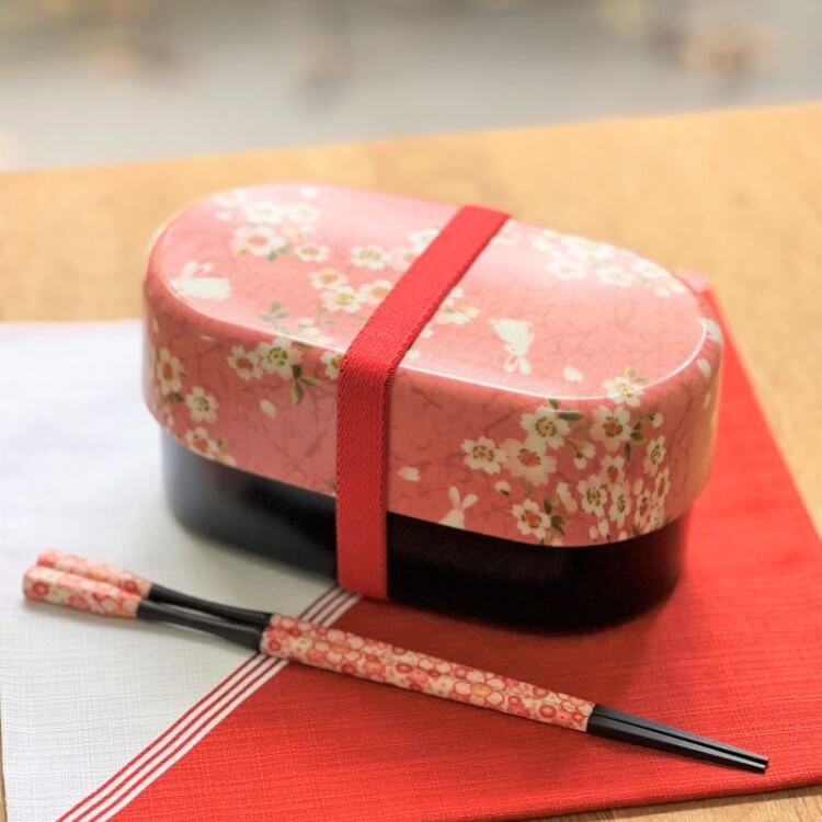 Japanese style bento box with chopsticks and furoshiki