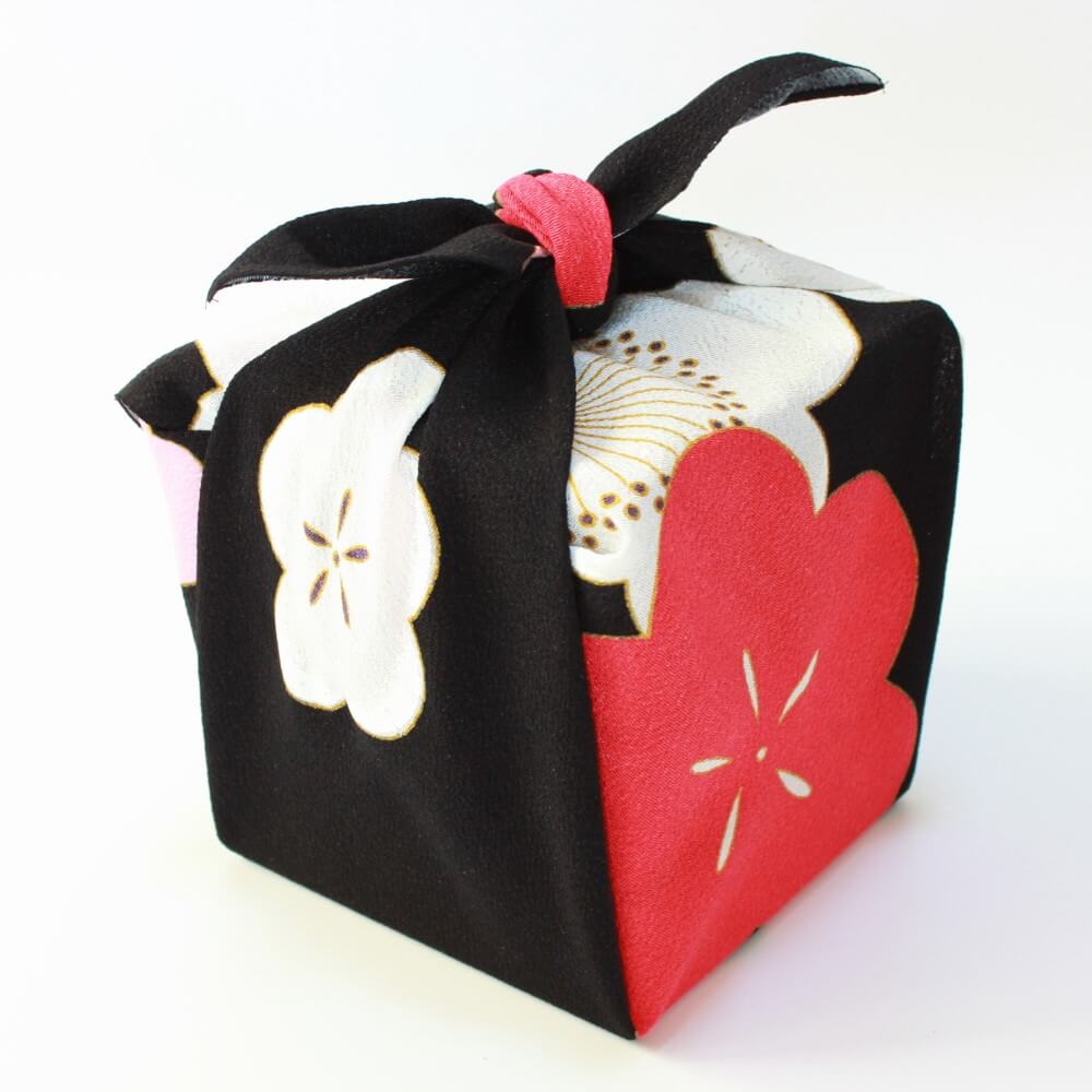 angled profile bento box wrapped with kasane ume furoshiki