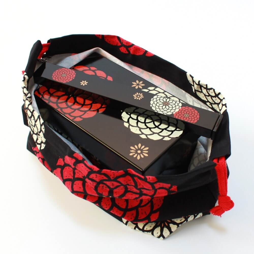 bento box chopsticks inside momoka black bento bag