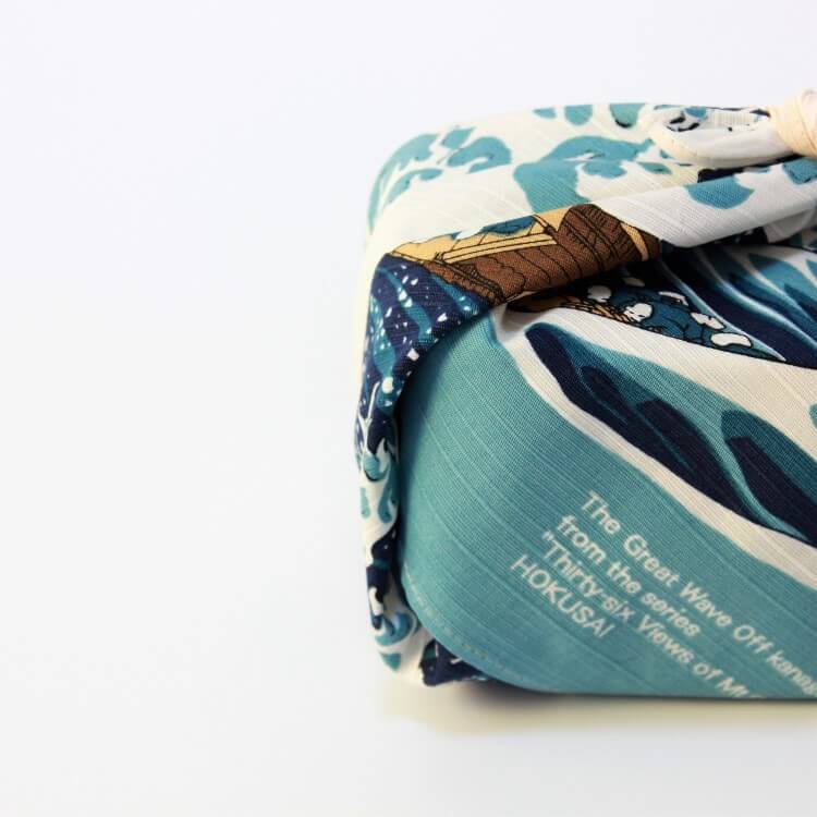 bento box wrapped with great wave furoshiki
