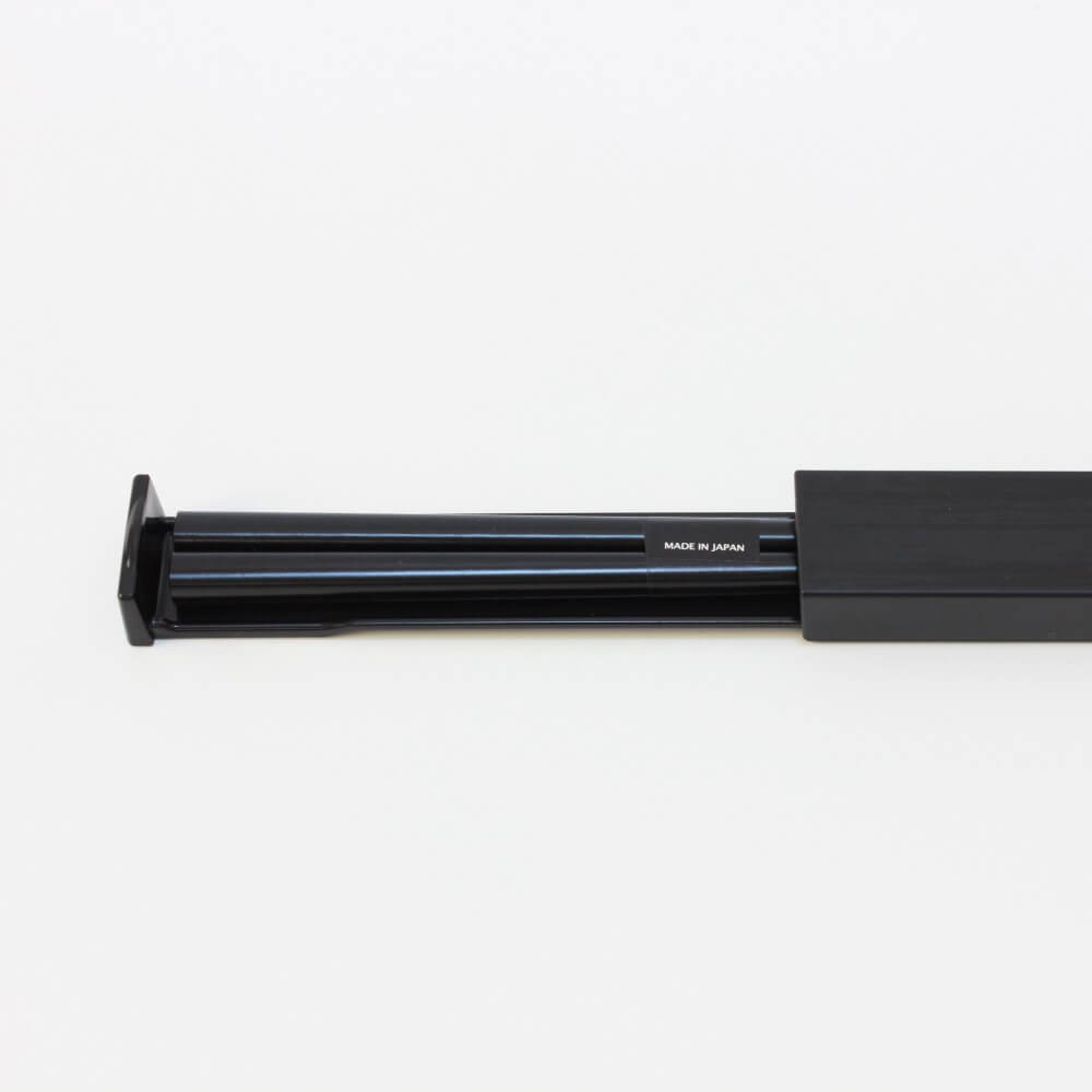 black chopsticks completely inside charcoal black case
