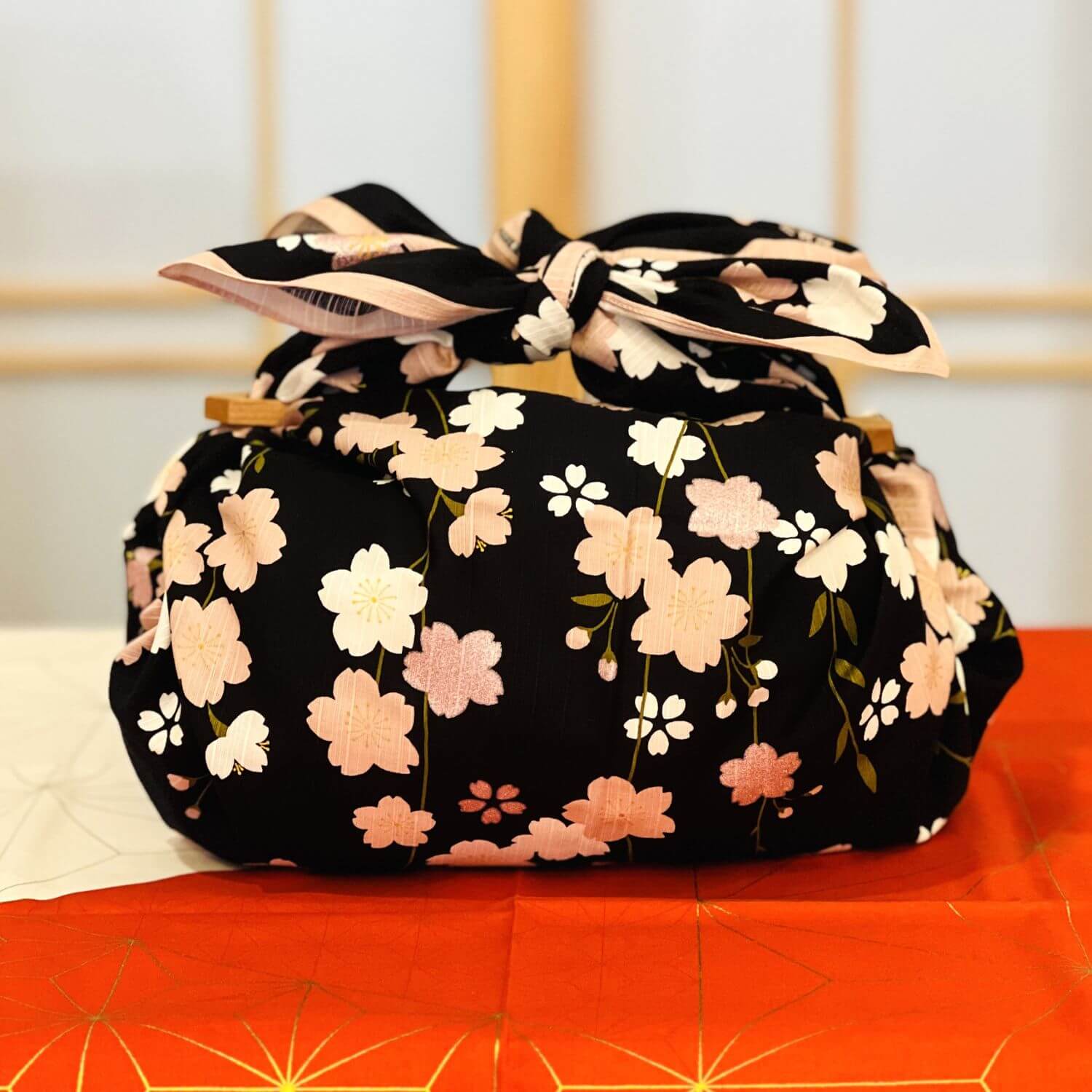 black furoshiki bag with patchin handles
