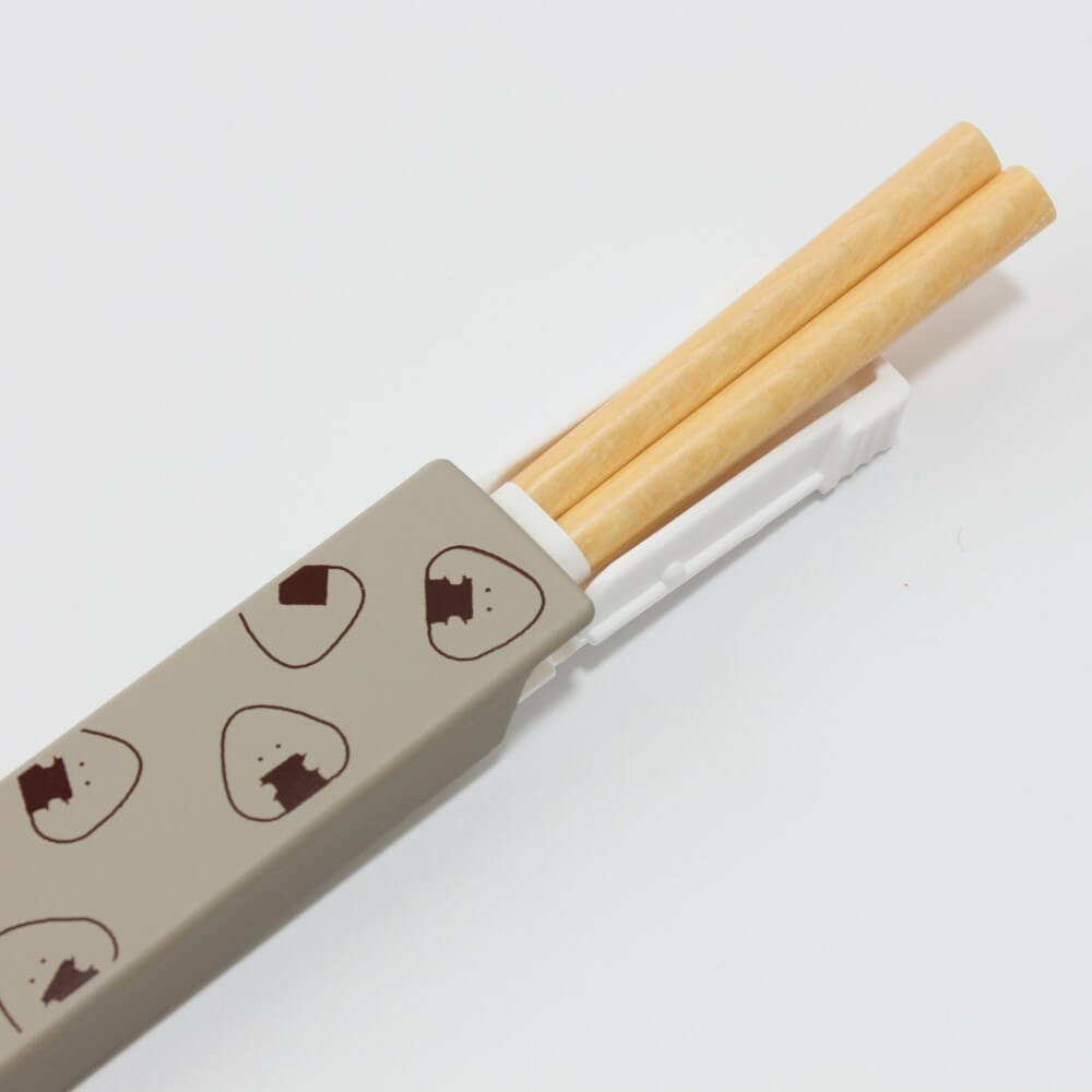 chopsticks inside grey onigiri case