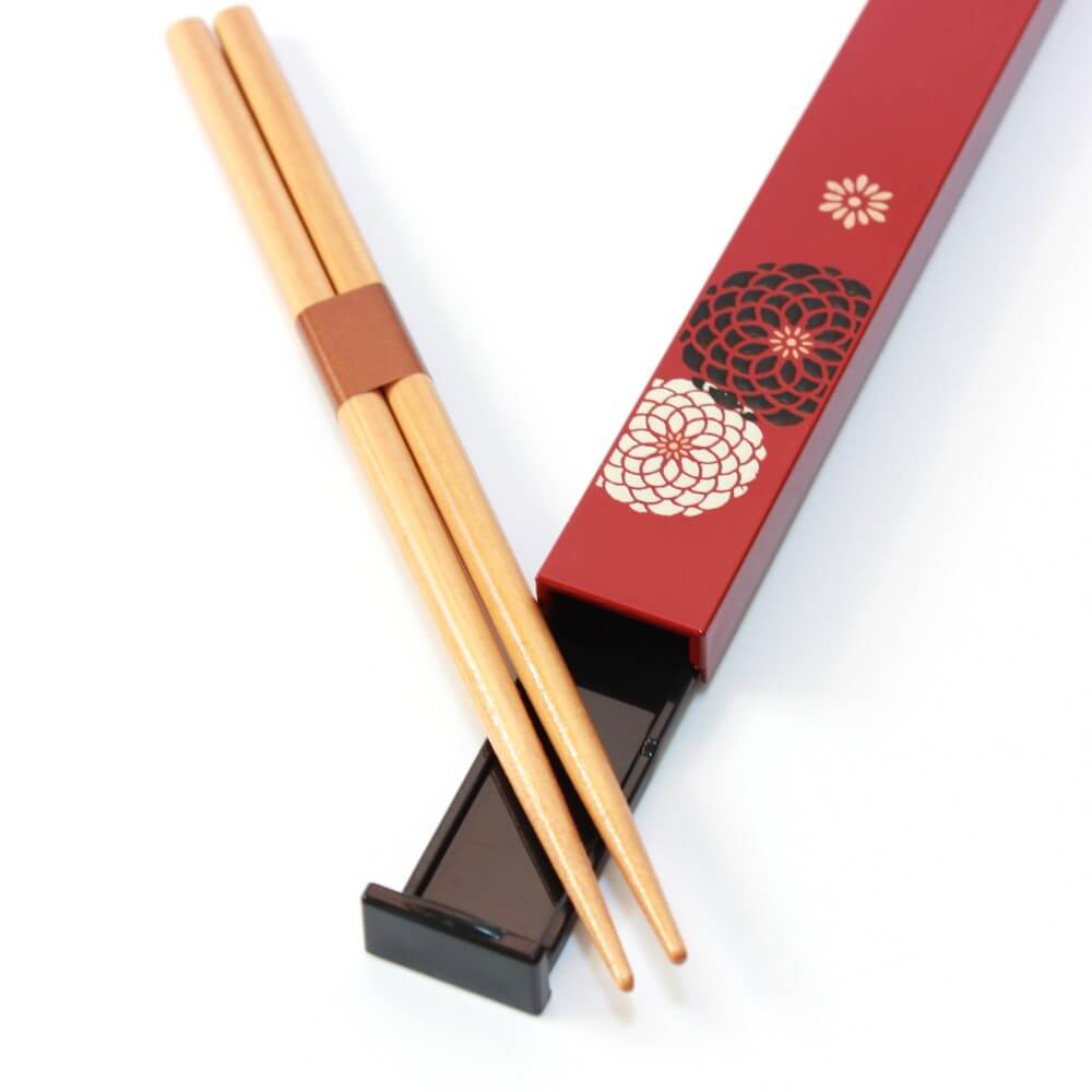 chopsticks laid on momoka red chopsticks case opened