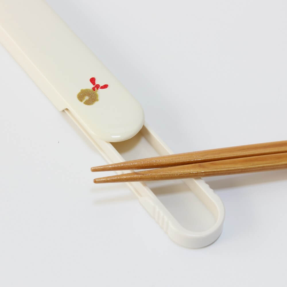 chopsticks on opened white chopsticks case