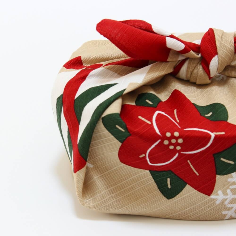 christmas furoshiki from hama monyo with poinsettia flower close up