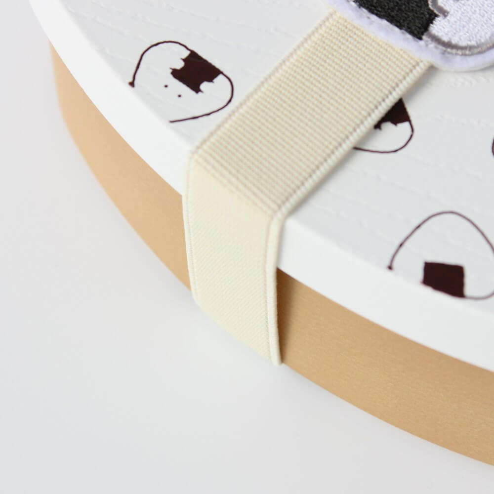 close up of beige tempura bento lunch band