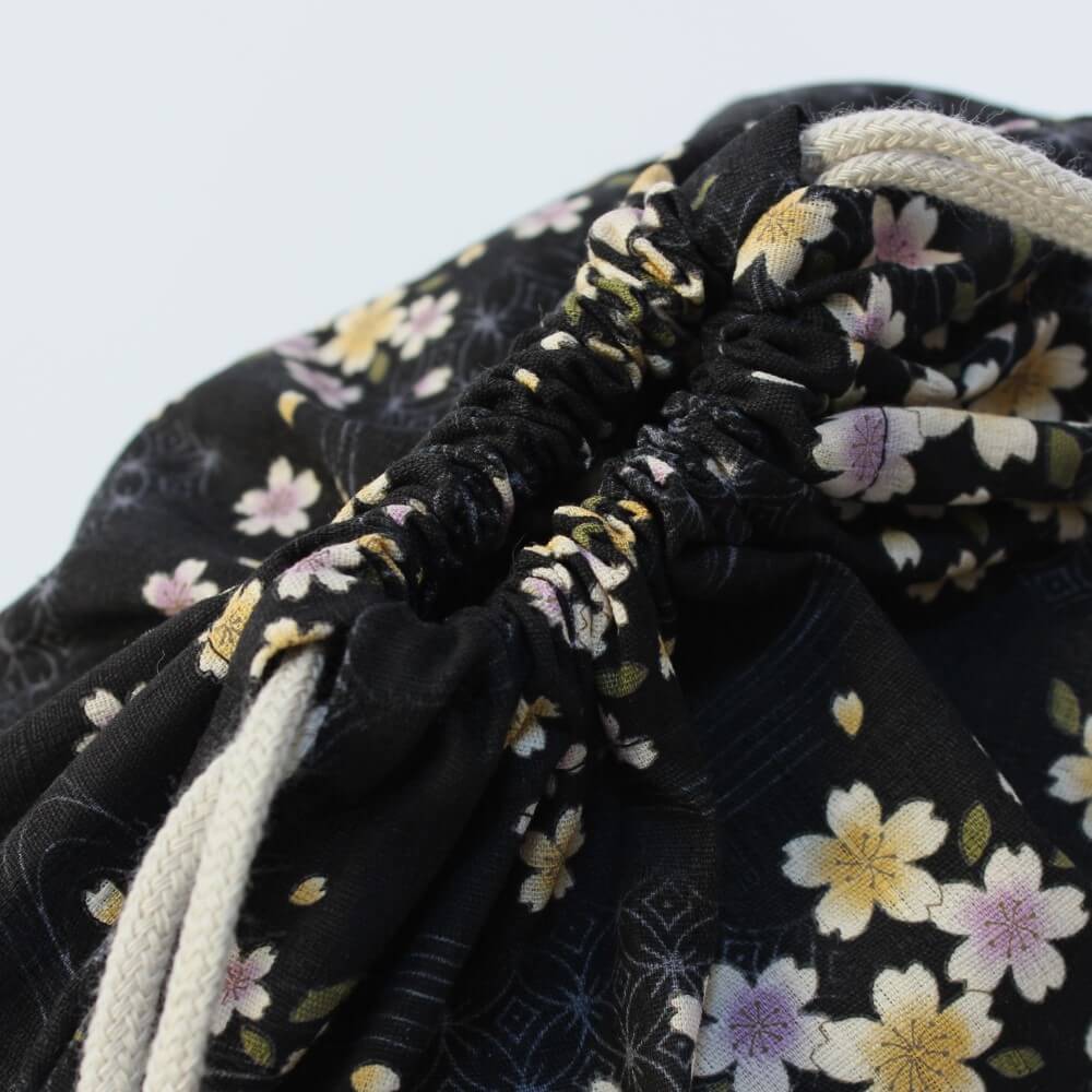 close up of drawtrings kinchaku bag