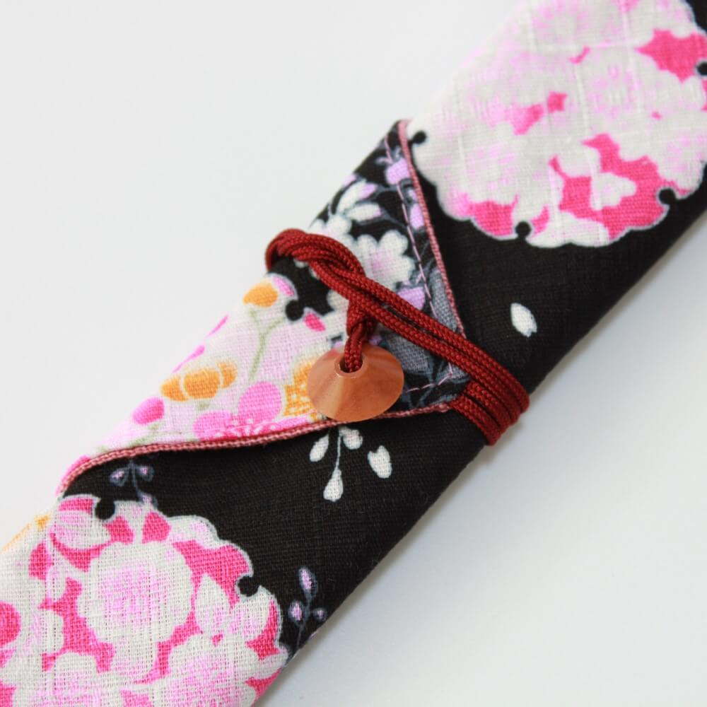 close up fastener chopsticks fabric case