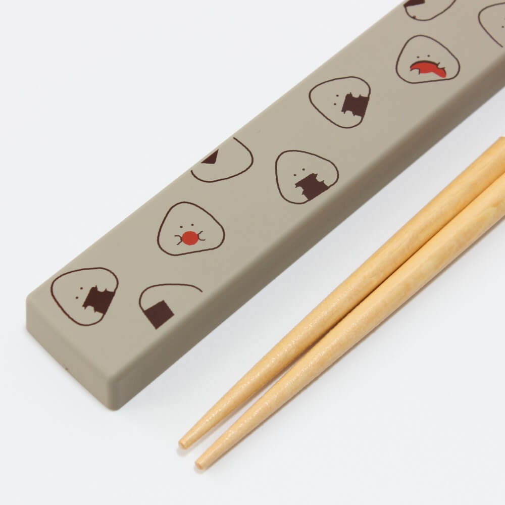 close up grey onigiri case chopsticks tiops