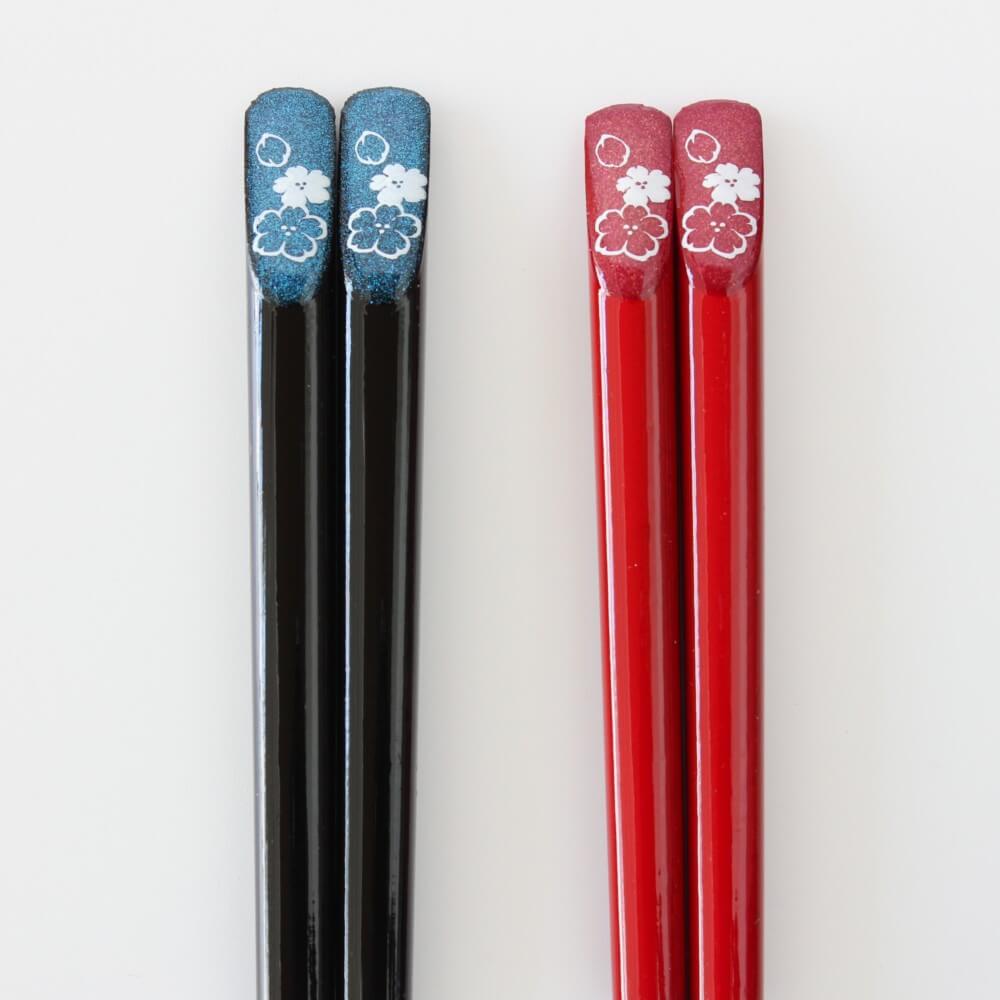 close up handles black and red tensoge cosmos chopsticks