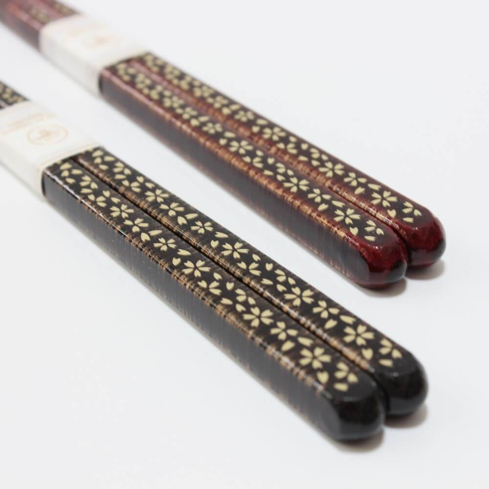 close up handles low angle sakura gold chopsticks gift set