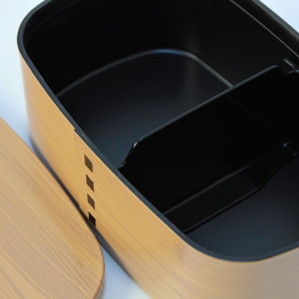 close up shot showing the inside of the hinoki 1 tier bento box.