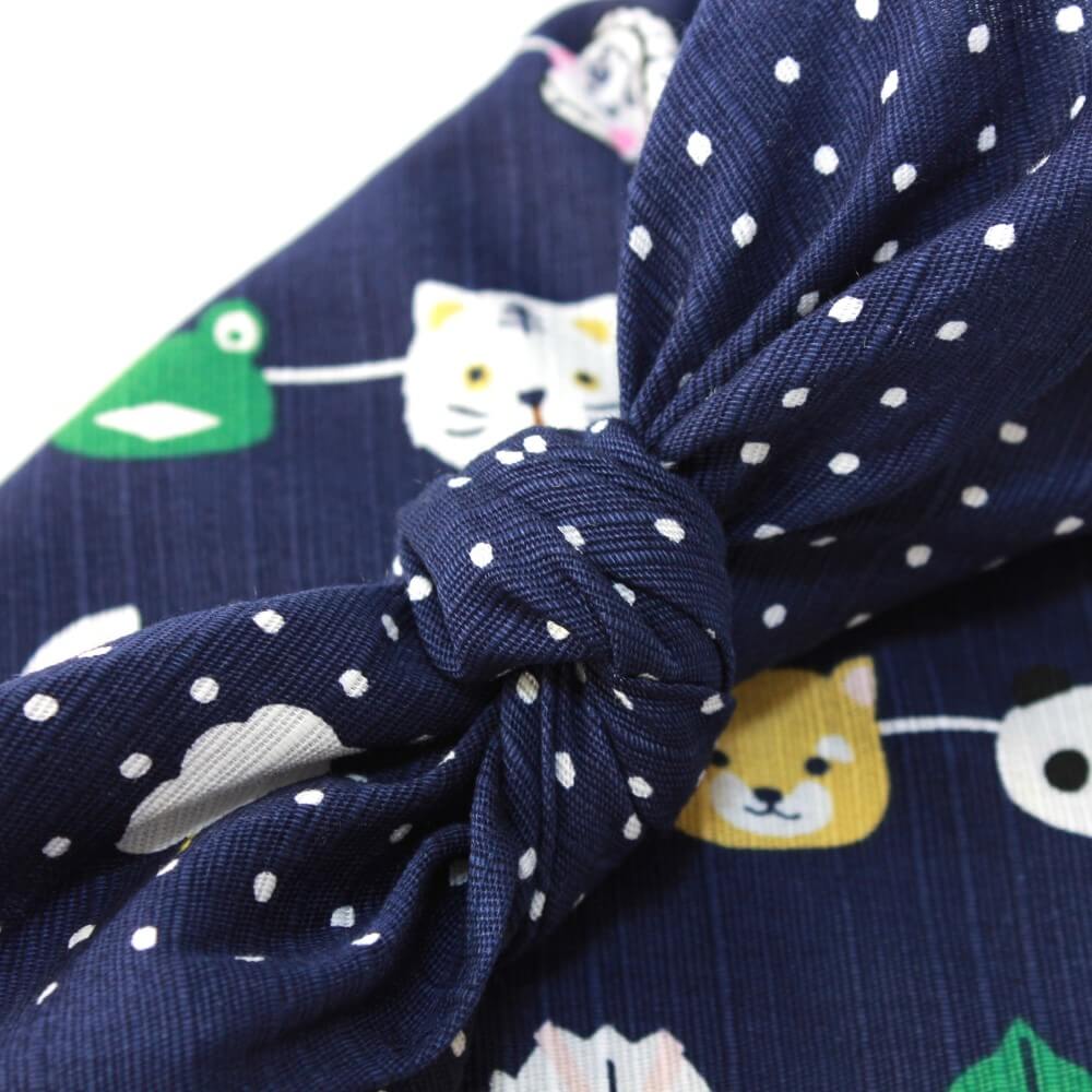 close up of knot japanese masks furoshiki