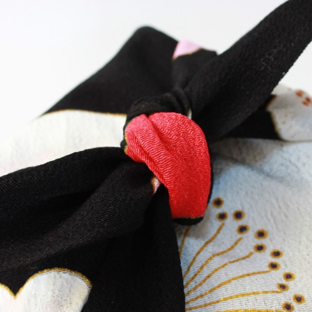 close up knot tied kasane ume furoshiki