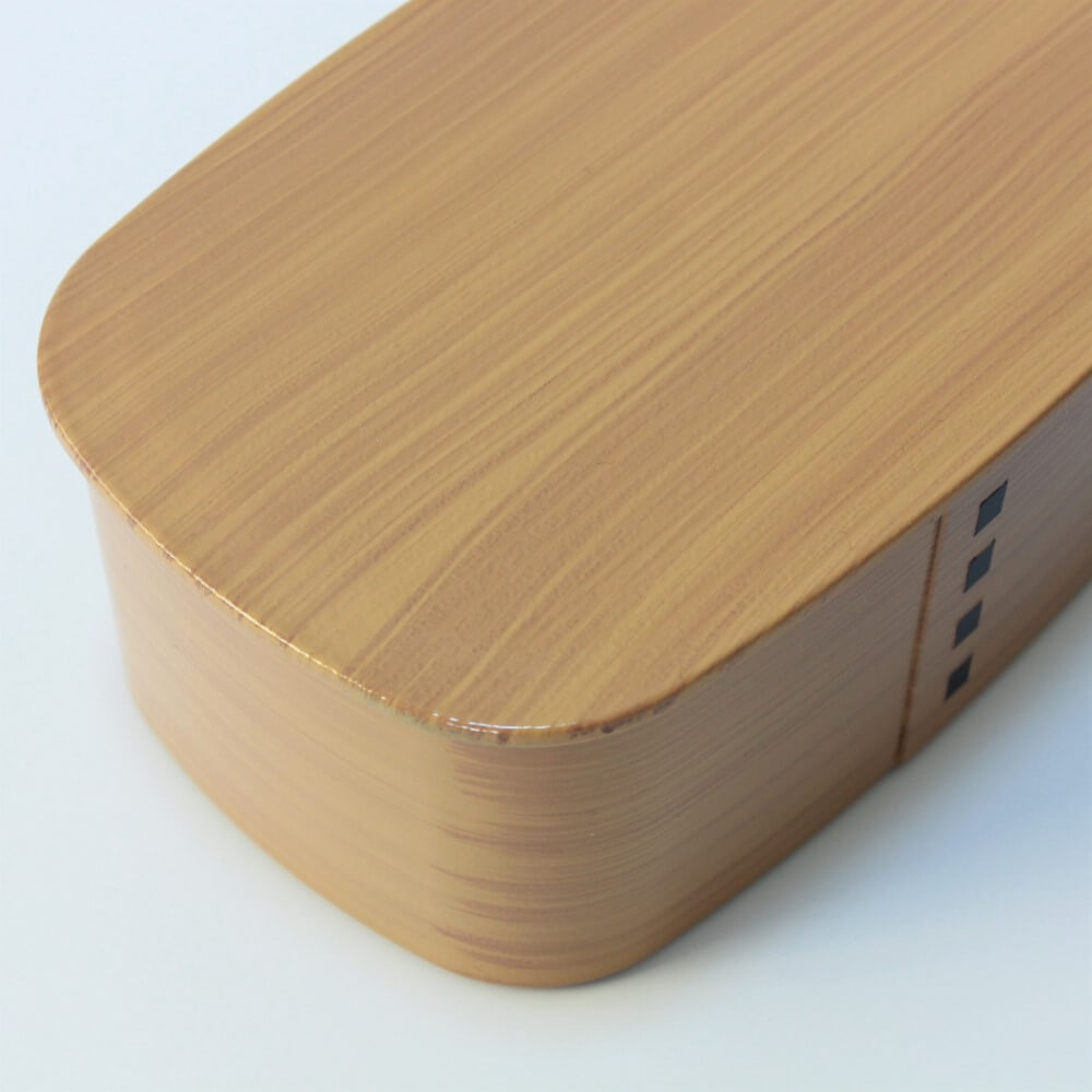 close up photo of the lid of the hinoki 1 tier bento box nuri wappa