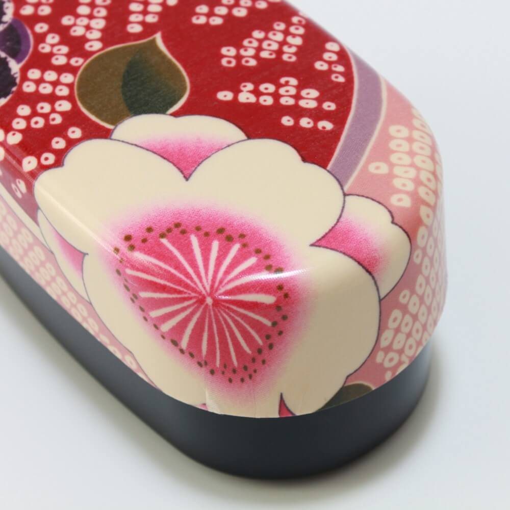 close up lid sakura blossoms oval bento box