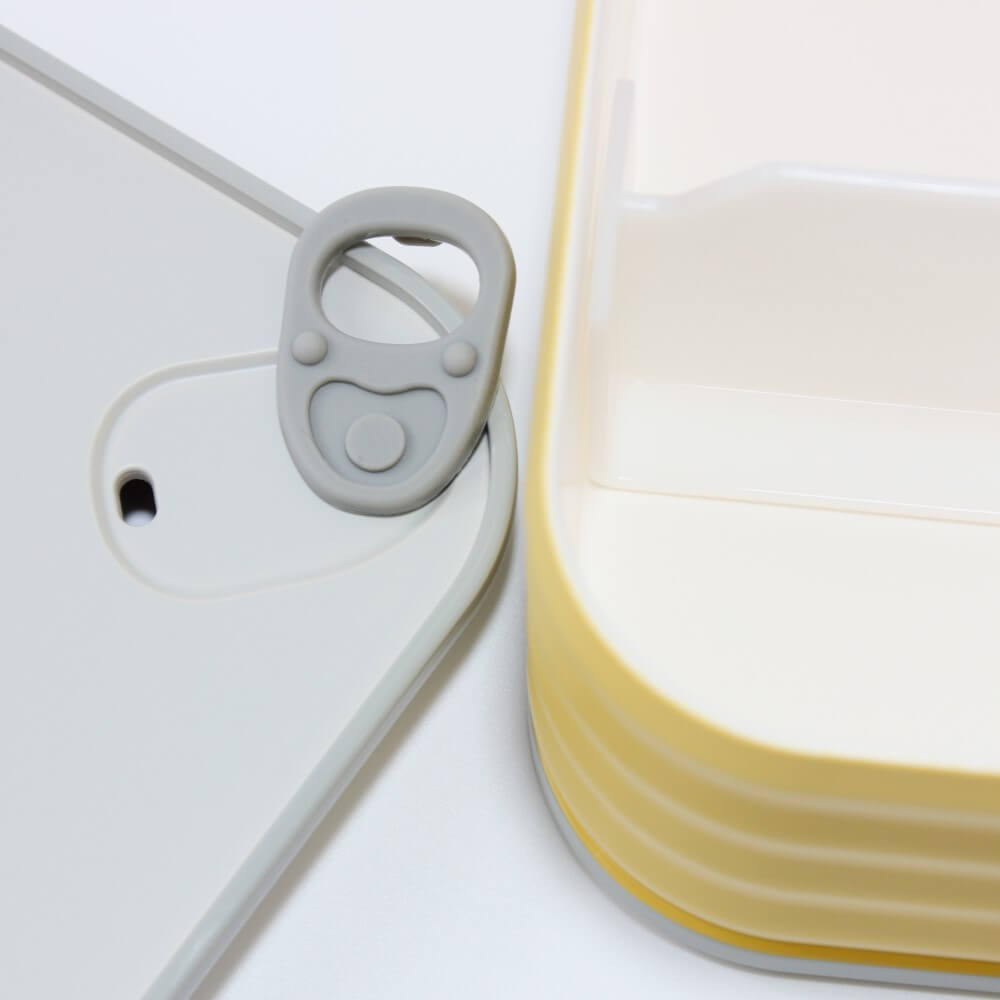 close up lid showing vento yellow eatcan bento box