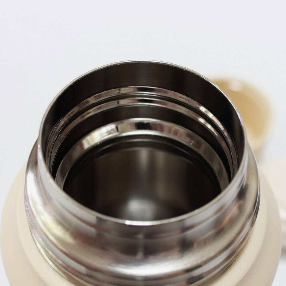 close up of mouth of 1L ivory trip bottle