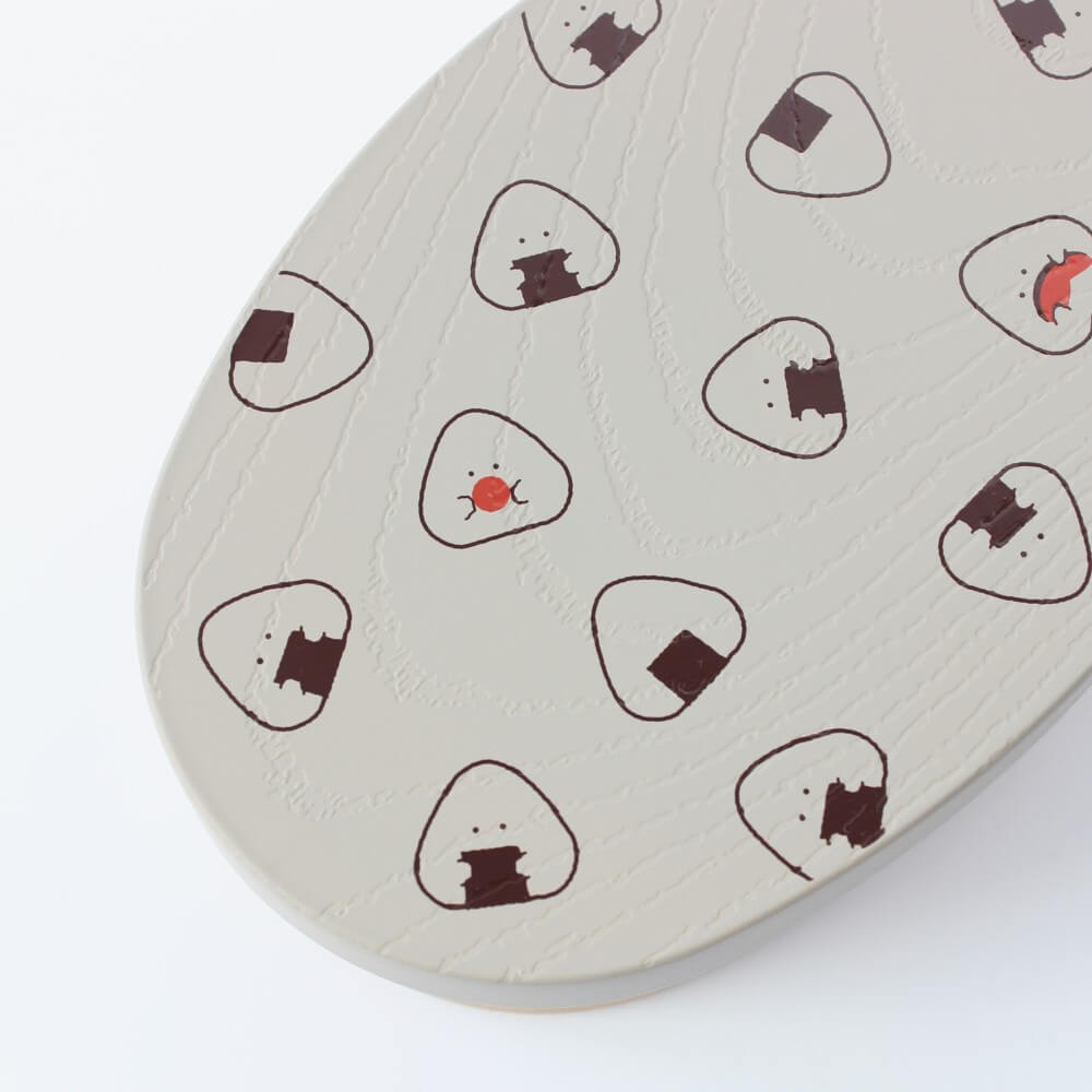 close up of onigiri patterns grey bento box