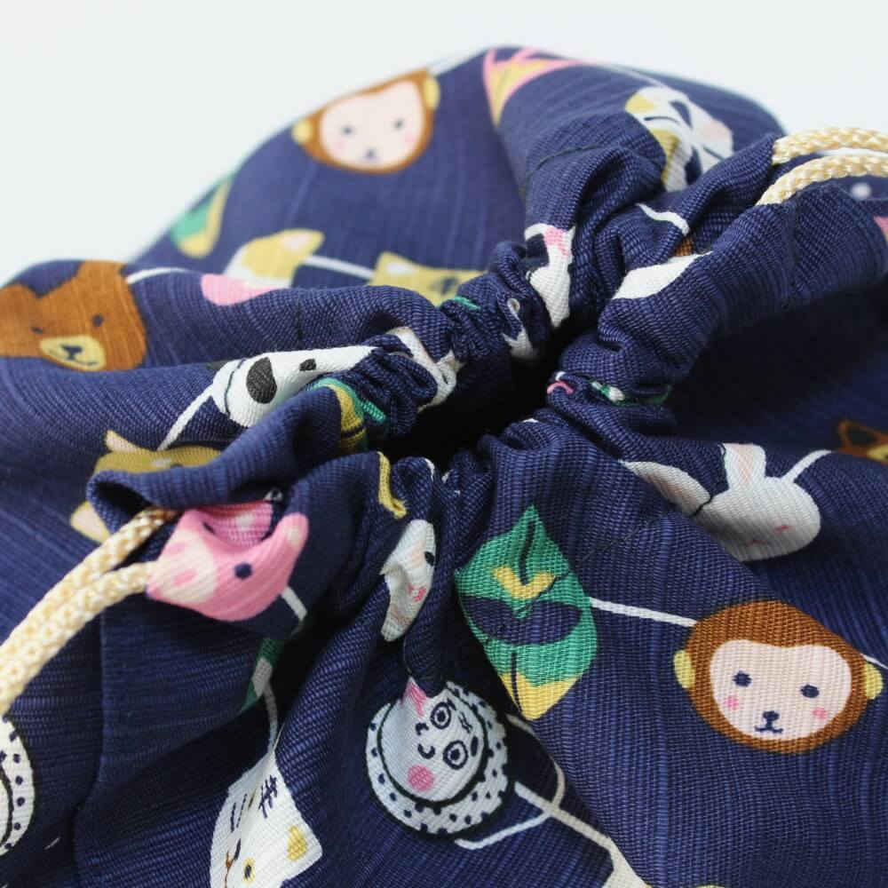 close up of drawn drawstring bag japanese masks design from hama monyo