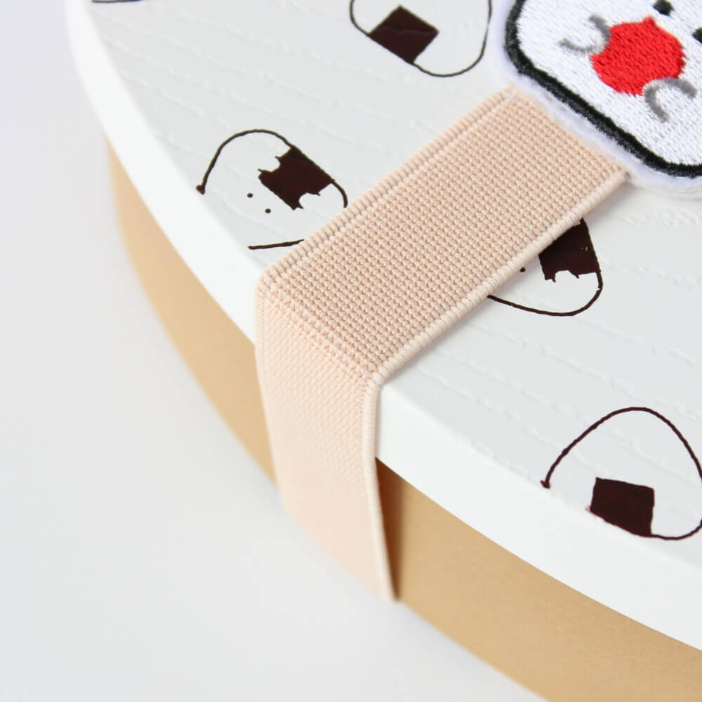 close up pink umeboshi bento lunch band