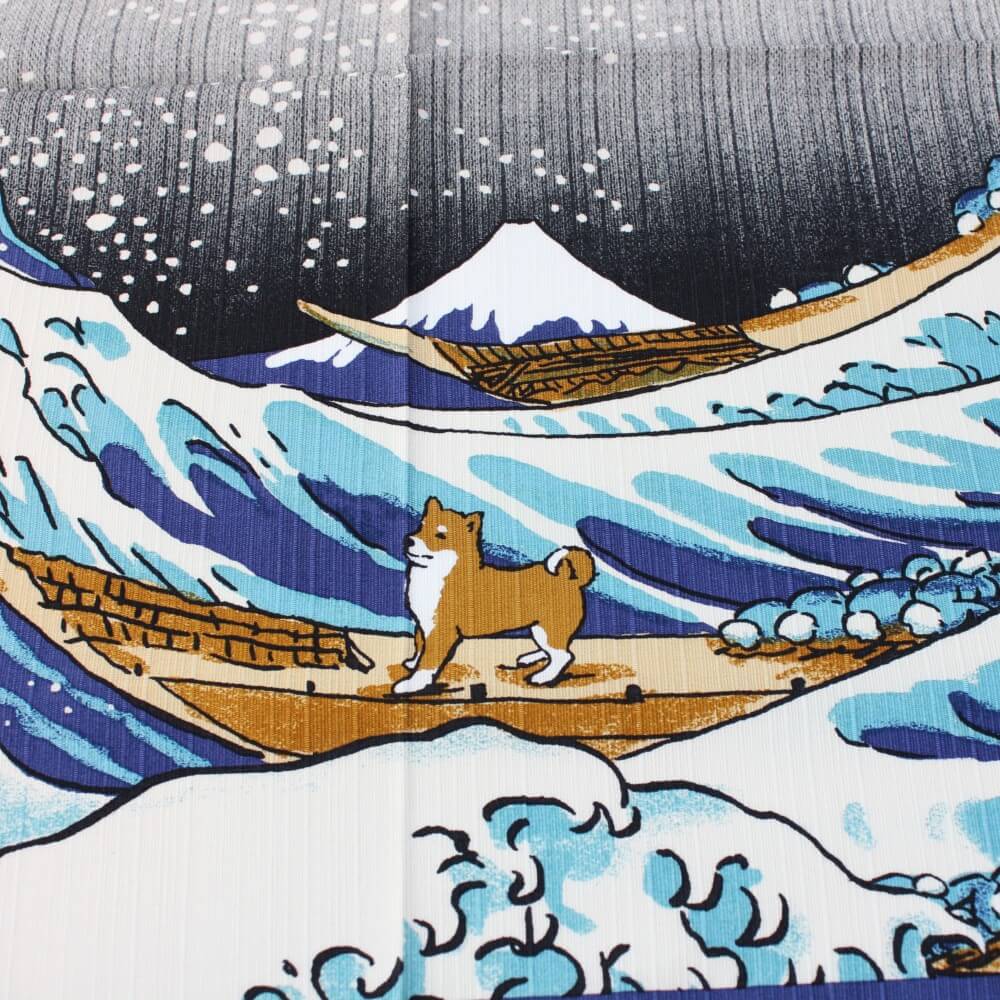 shiba dog on a raft with mount fuji in the background furoshiki