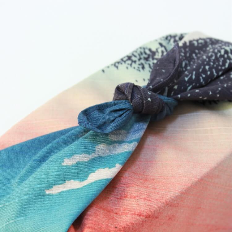 close up shot showing knot of red fuji wrapping cloth from japan