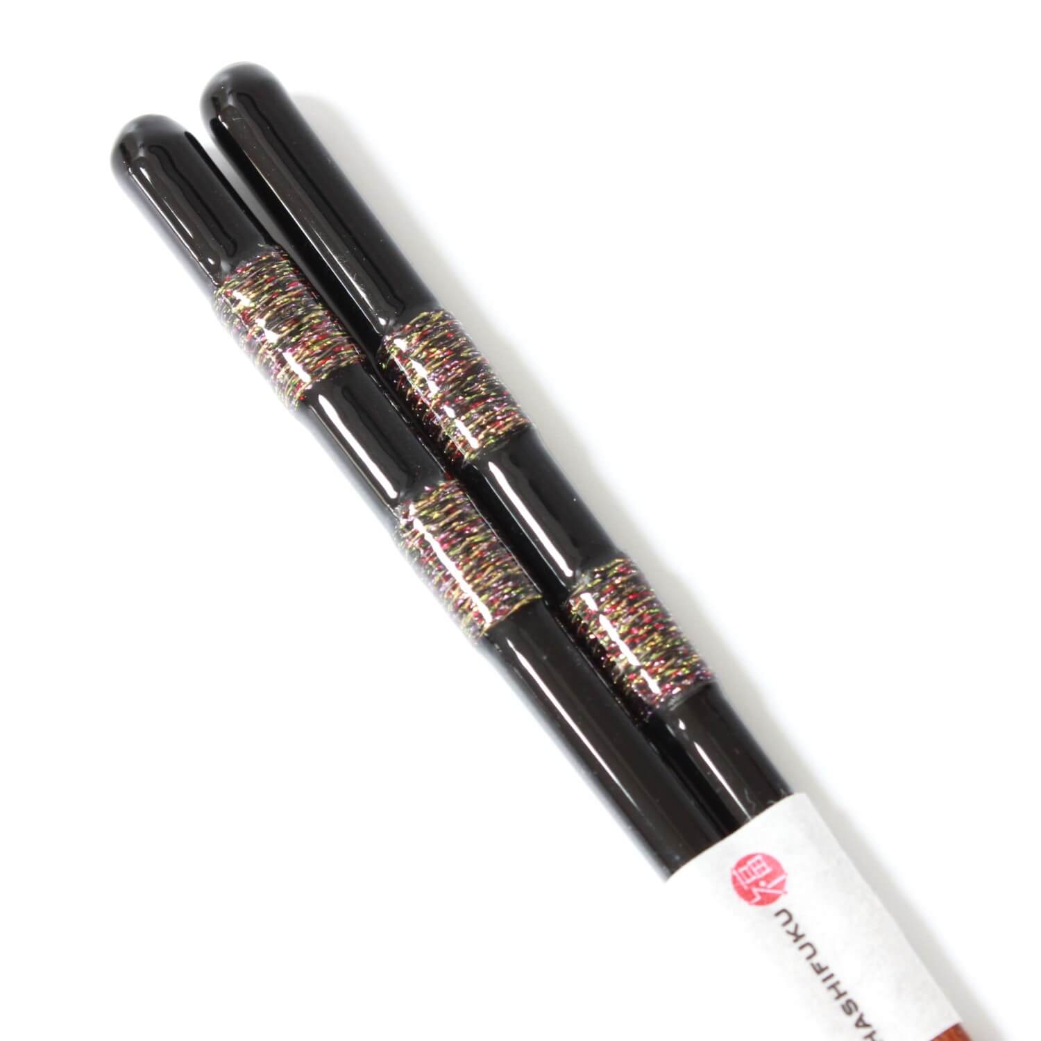 close up showing the design inside the handles of the hananoito black chopsticks