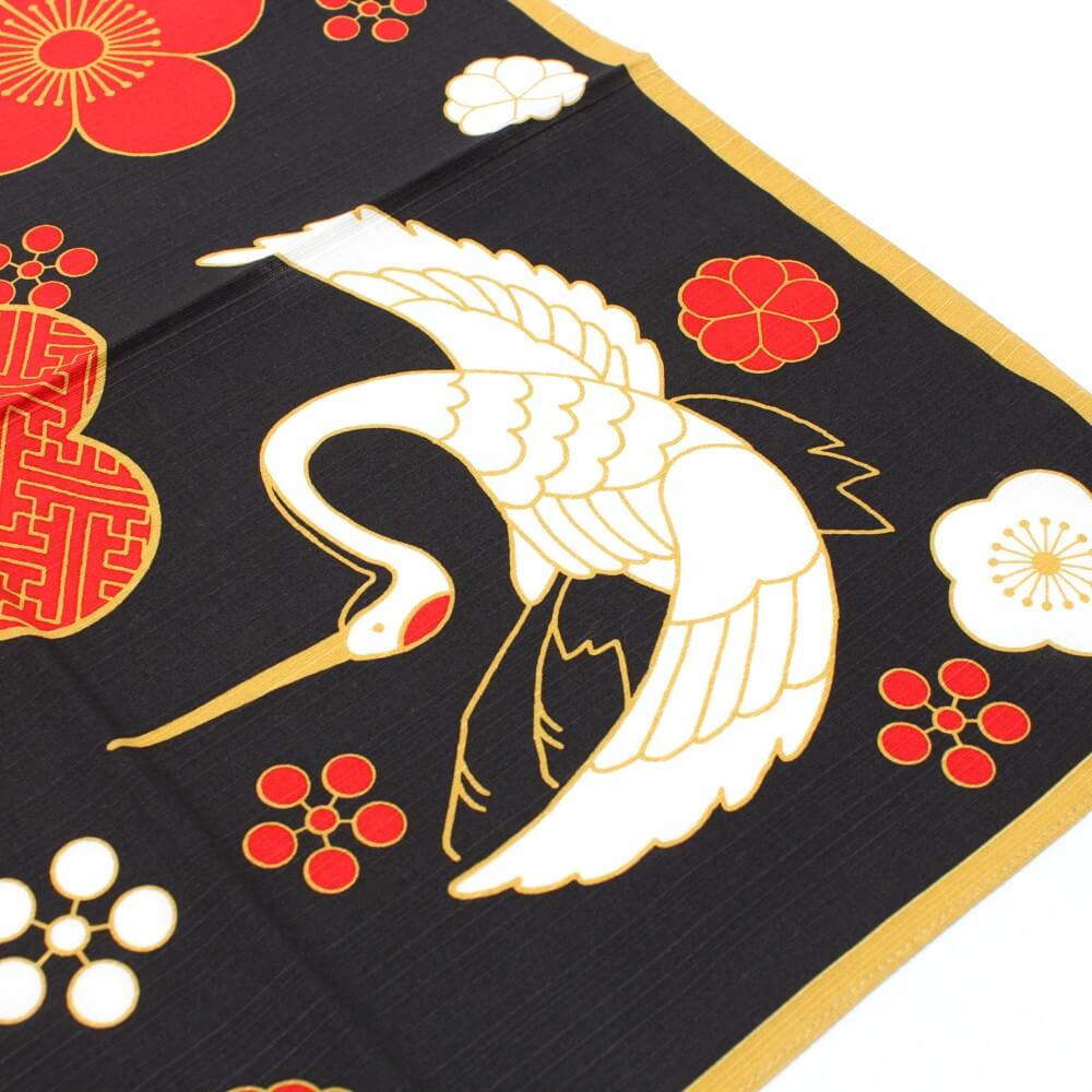 close up of white crane pattern on the hama monyo furoshiki