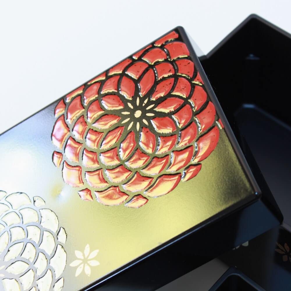 close up flower lid hakoben black bento box
