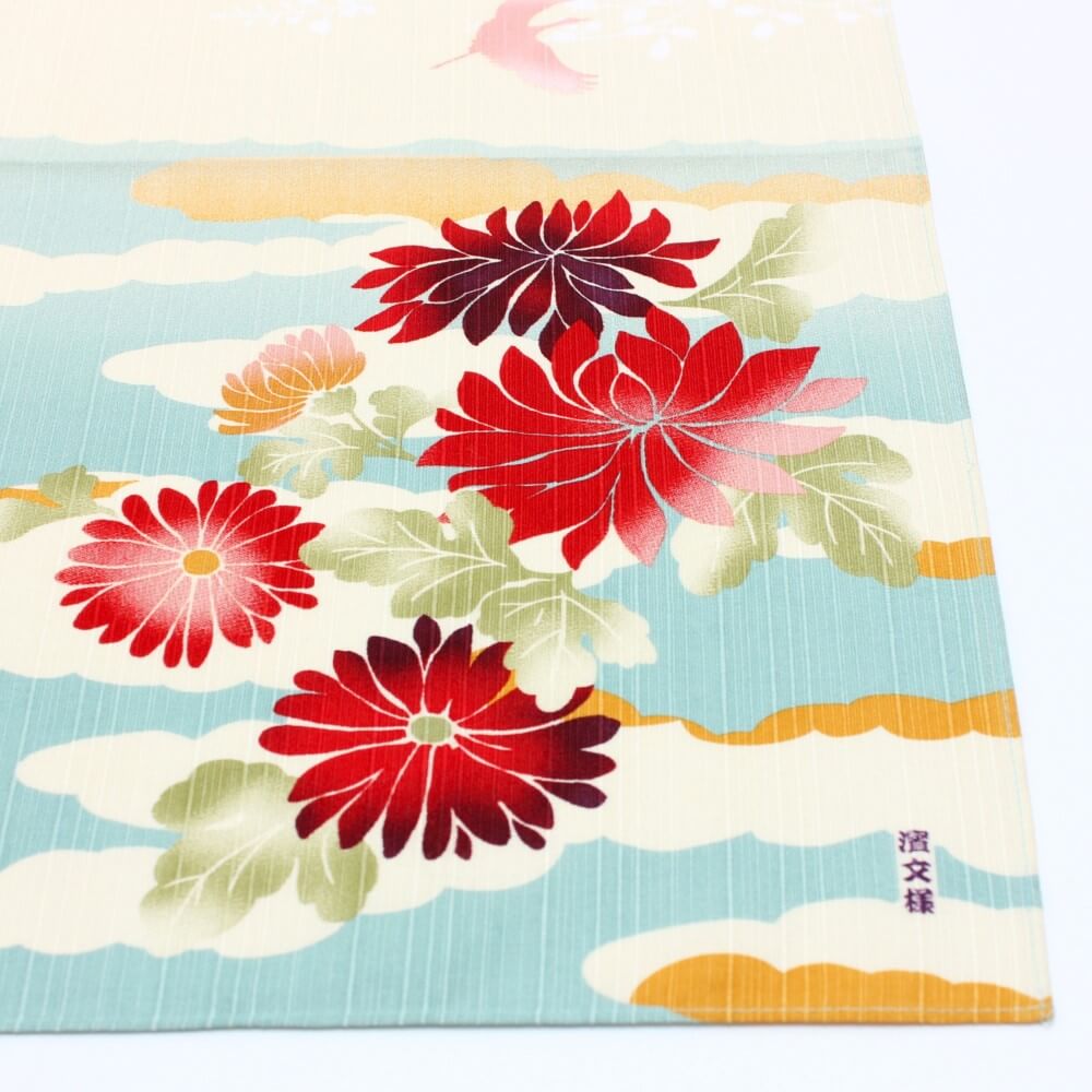 corner of dream autum furoshiki showing red chrysanthemum flowers