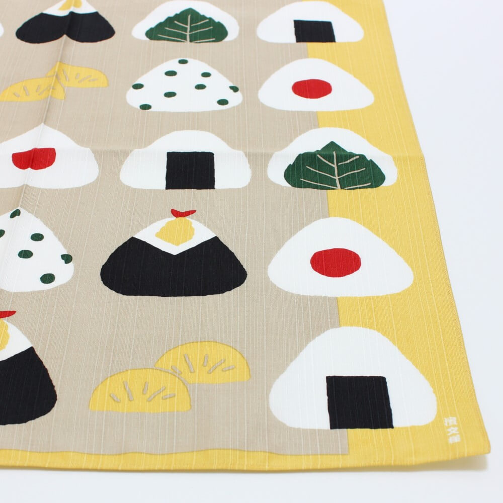 corner of onigiri tsutsumi furoshiki showing onigiri artwork