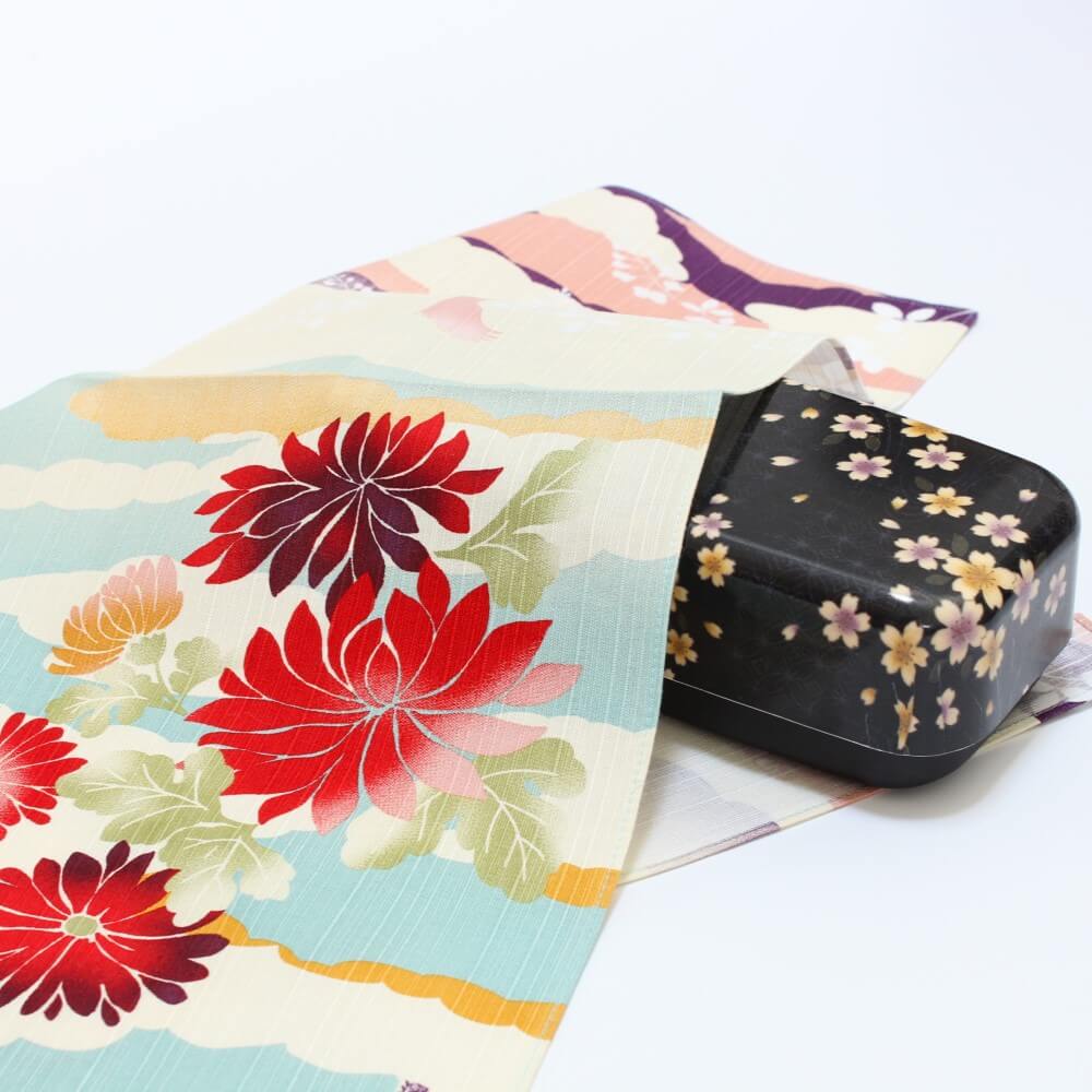 dream autumn furoshiki with chrysanthemum flower patterns covering a black bento box