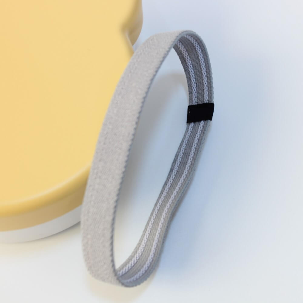 close up of the grey elastic band showing the underside too