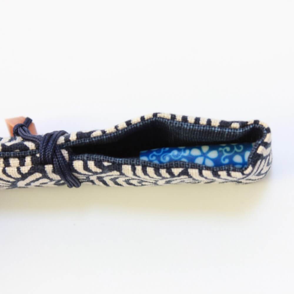 closed fabric chopsticks case with chopsticks inside