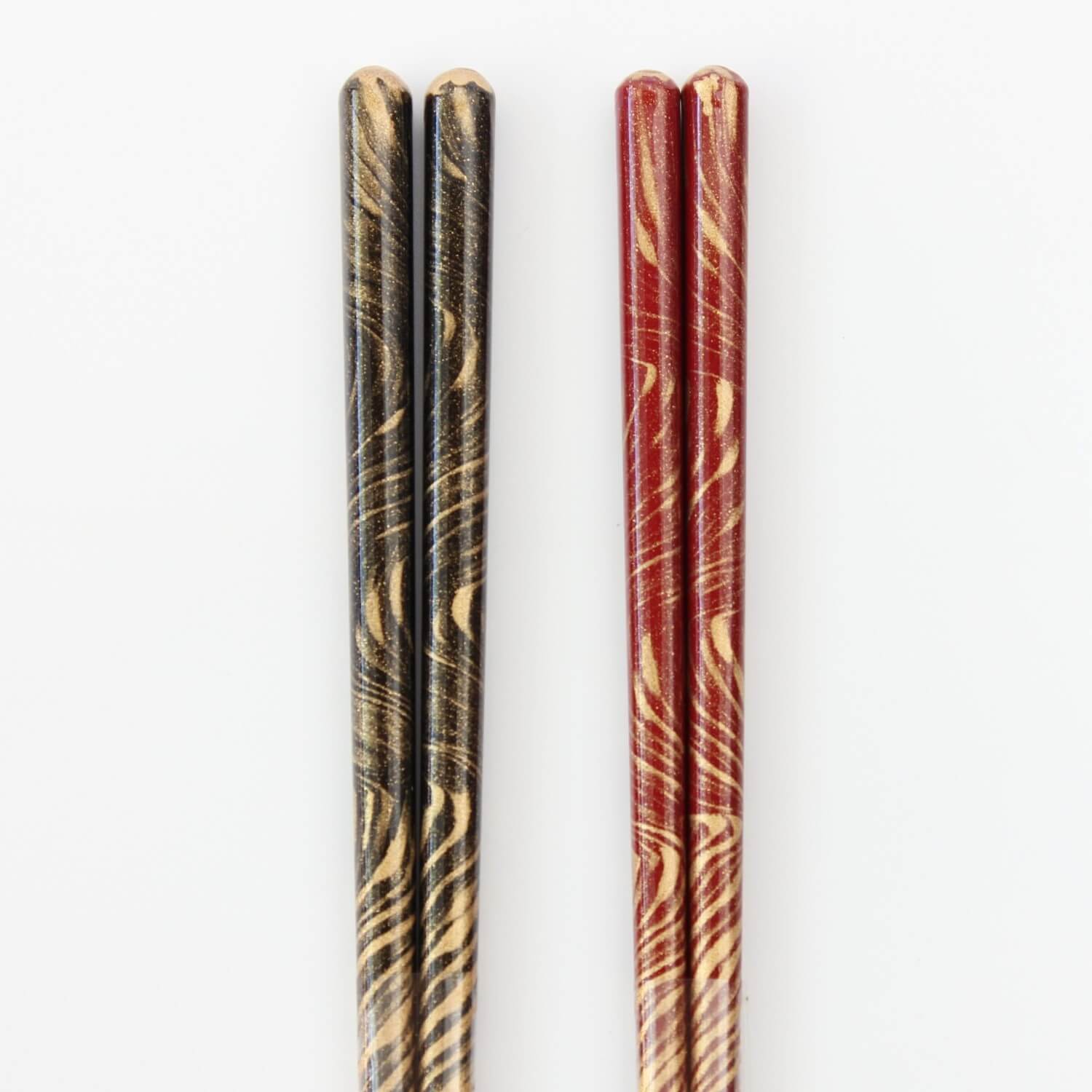 handles close up tenryu black and red chospticks
