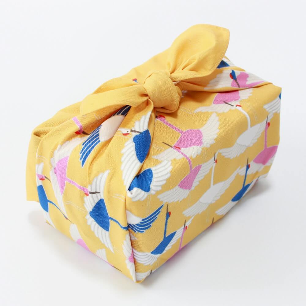 hime musubi crane yellow furoshiki top down photo