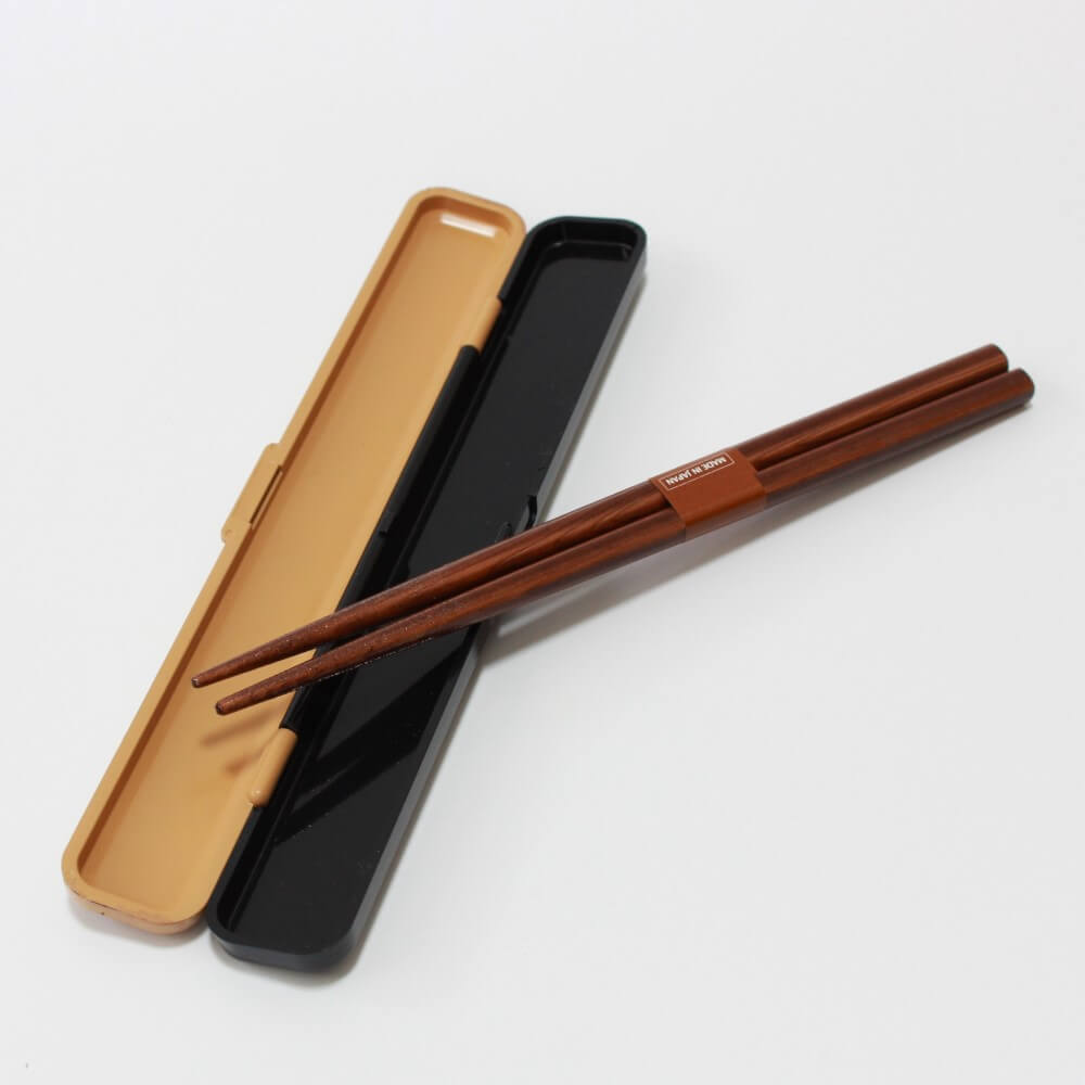 hinoki nuri wappa chopsticks case opened with chopsticks