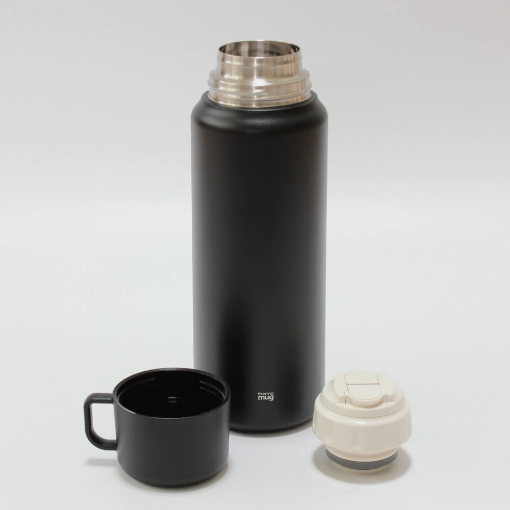 inner outer caps removed 100ml trip bottle black