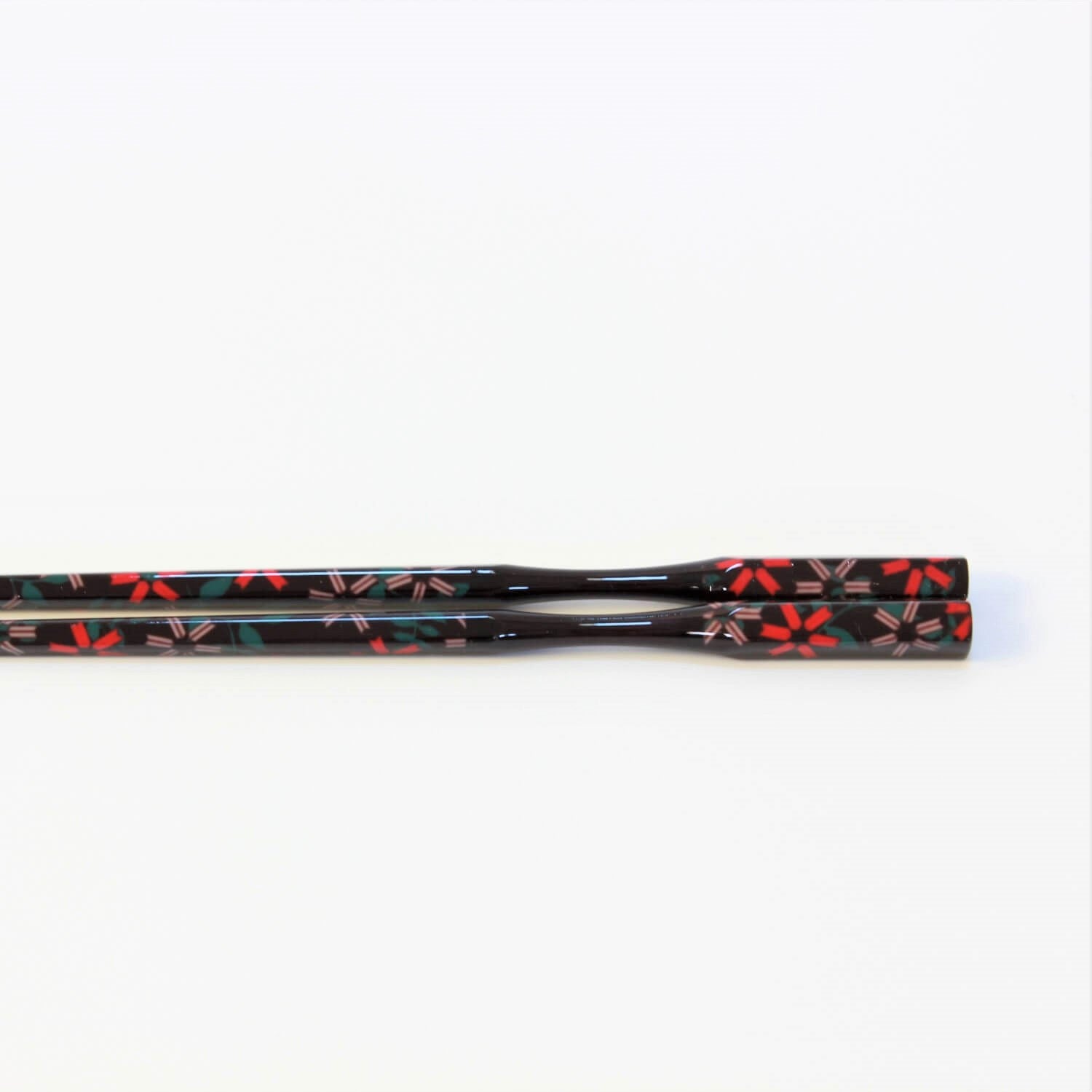 japanese chopsticks laying flat showing curved neck