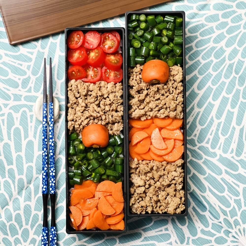 japanese lunch in natural woodgrain long slim brown bento box