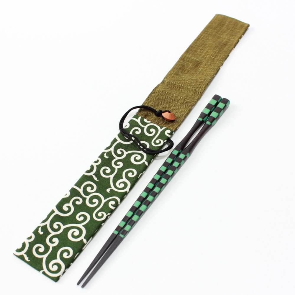 karakusa green case opened with chopsticks by the side