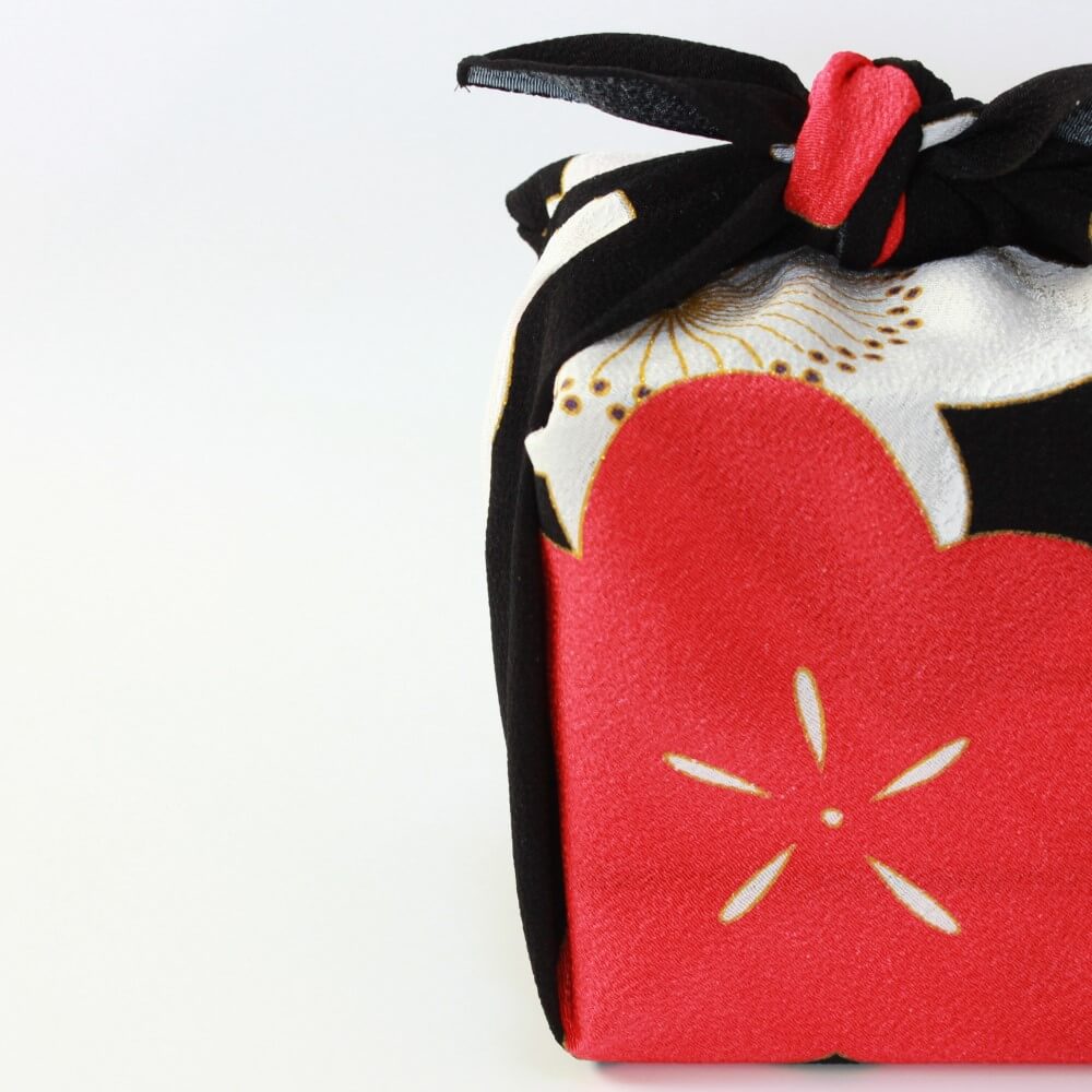 kasane ume black furoshiki showing red plum flower