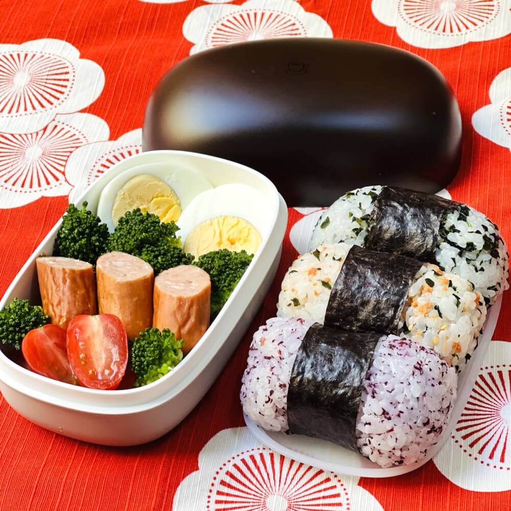 onigiri on inner lid bread shaped bento box