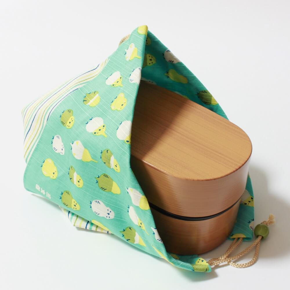 parakeets bento lunch bag bento box halfway inside