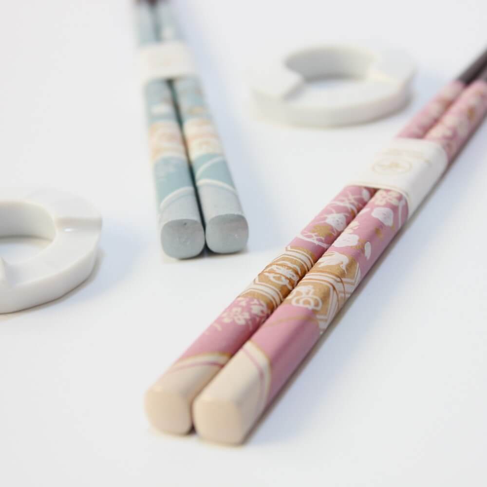 pink kimono chopsticks in foreground